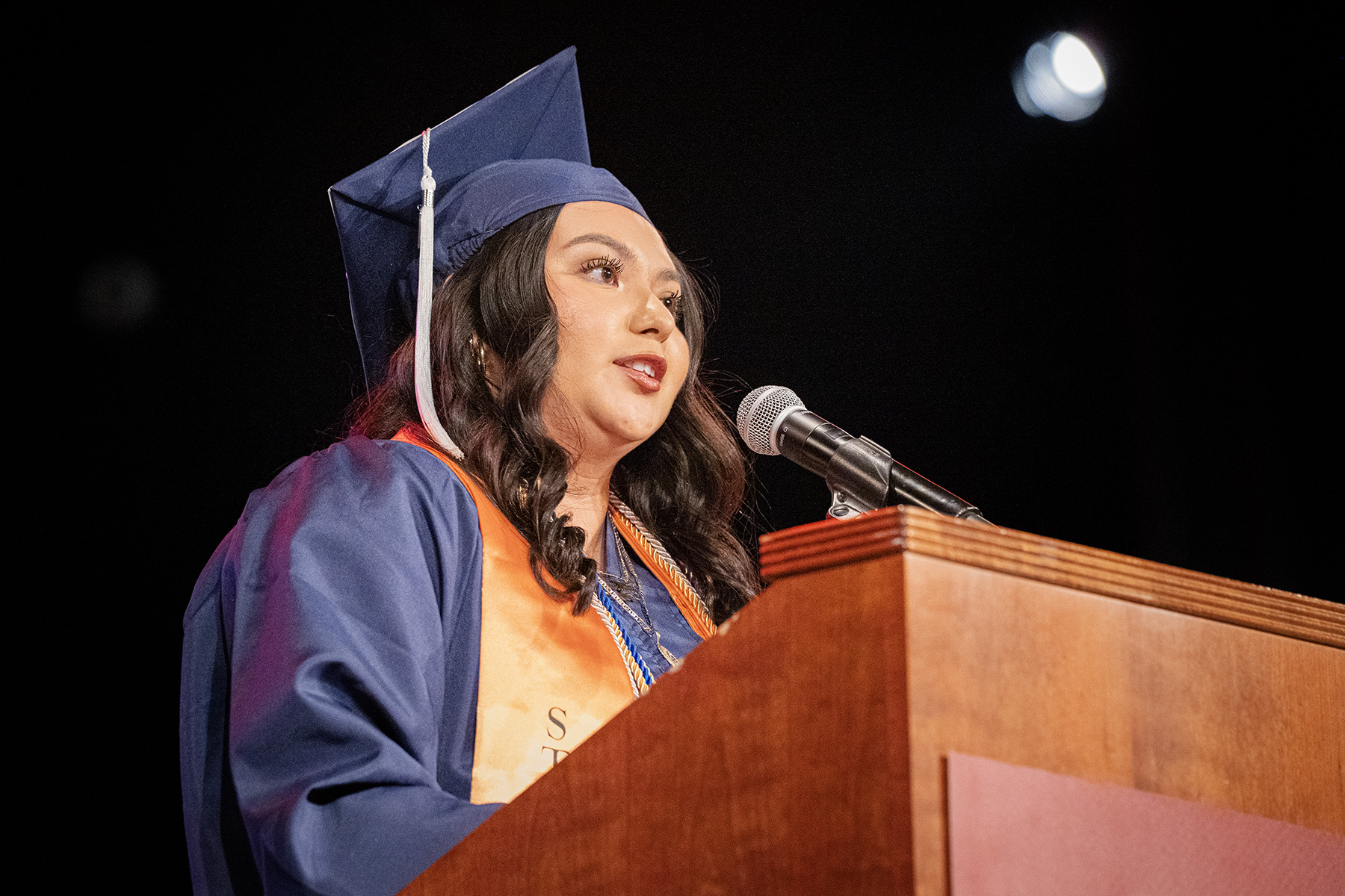 Elexiana Olivia giving her commencement speech at Muscatine Community College. 