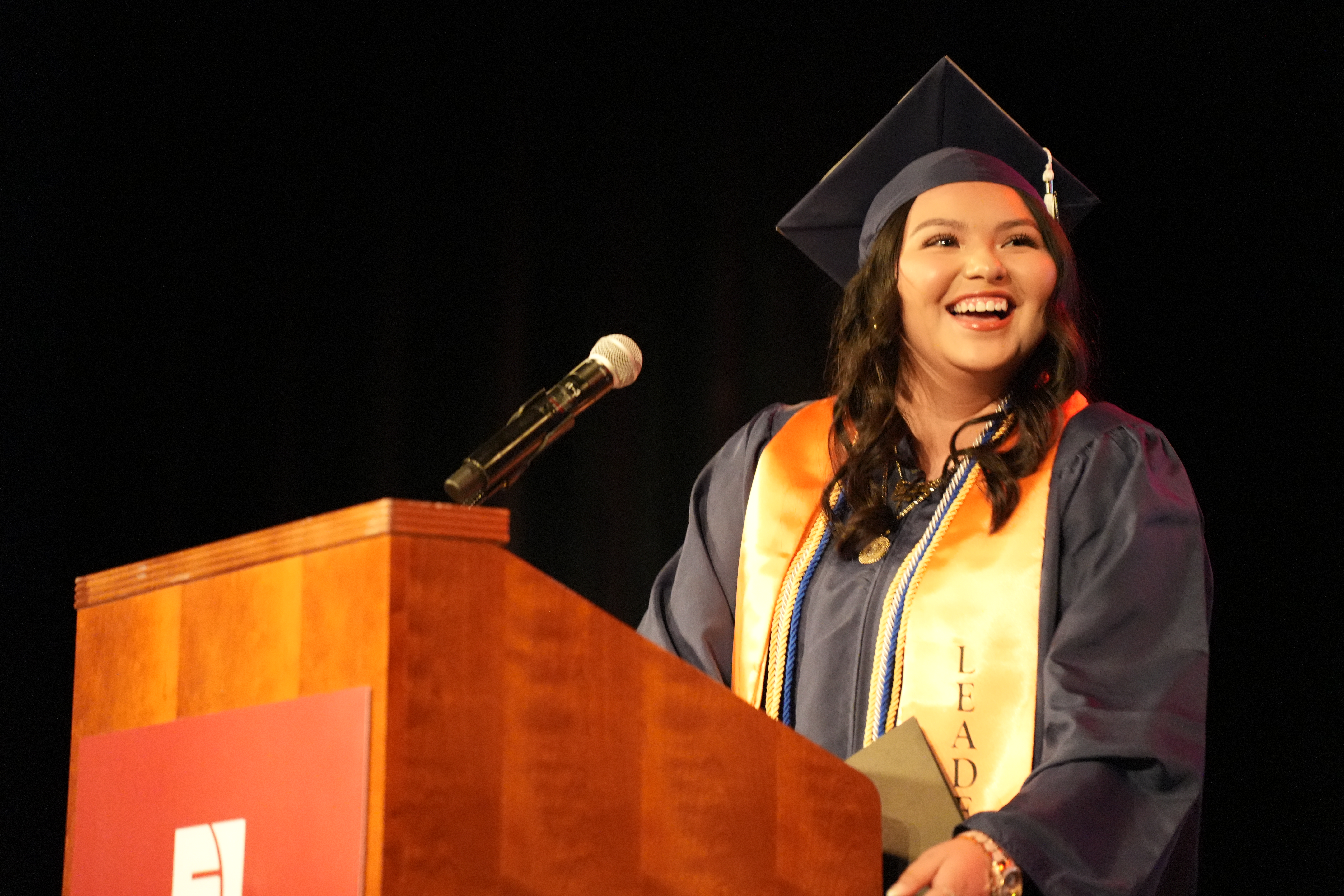 Elexiana Olivia giving her commencement speech at Muscatine Community College. 