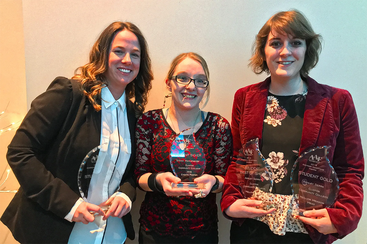 Eve Van Kampen, Sydney Wohlstadter, and Ashley Serra holding Addy Awards